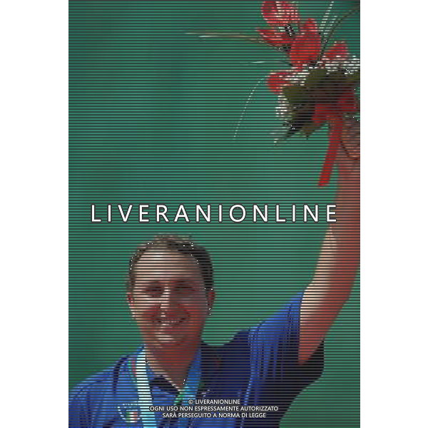 (110819) -- SHENZHEN, Aug. 19, 2011 () -- Marco Panizza of Italy celebrates during the awarding ceremony of men\'s trap of shotgun at the 26th Summer Universiade in Shenzhen, a city of south China\'s Guangdong Province, on Aug. 19, 2011. Marco Panizza won the gold medal of the event. (/Lin Yiguang)(wx)
