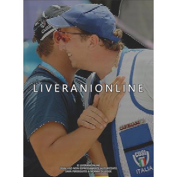 (110819) -- SHENZHEN, Aug. 19, 2011 () -- Marco Panizza (R) of Italy celebrates with his coach after men\'s trap of shotgun at the 26th Summer Universiade in Shenzhen, a city of south China\'s Guangdong Province, on Aug. 19, 2011. Marco Panizza won the gold medal with a total score of 146. (/Lin Yiguang)(wx)