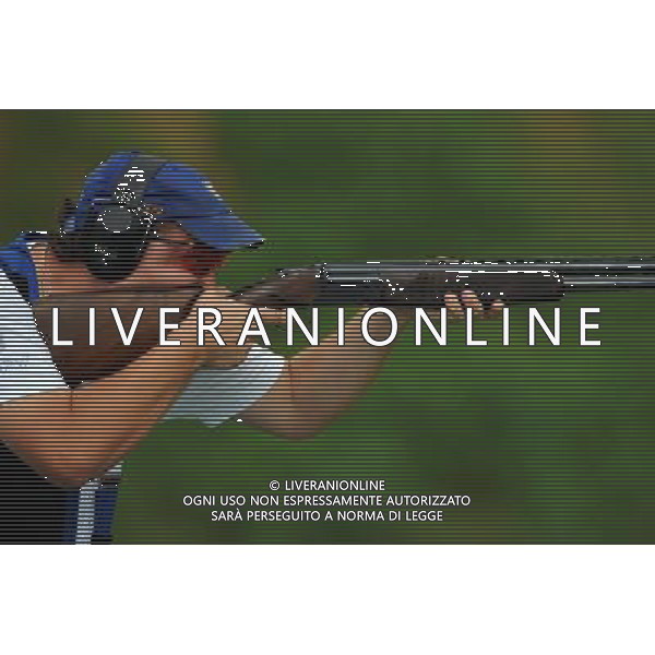 (110819) -- SHENZHEN, Aug. 19, 2011 () -- Marco Panizza of Italy shoots during men\'s trap team event of shotgun at the 26th Summer Universiade in Shenzhen, a city of south China\'s Guangdong Province, on Aug. 19, 2011. Italy won the gold medal with total score of 363 in the event. (/Lin Yiguang)(wx)