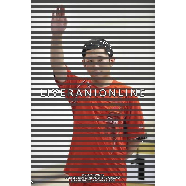 (110819) -- SHENZHEN, Aug. 19, 2011 () -- Ding Feng of China greets the spectators during the 25m rapid fire pistol men individual of shooting event at the 26th Summer Universiade in Shenzhen, a city of south China\'s Guangdong Province, on Aug. 19, 2011. Ding Feng claimed the title of the event. (/Chen Yehua)