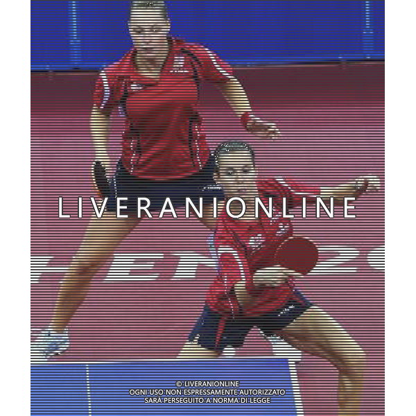 (110819) -- SHENZHEN, Aug. 19, 2011 () -- Dana Hadacova (above) and Iveta Vacenovska of Czech Republic compete during the women\'s doubles table tennis semifinal against Tang Liying and Xiong Xinyun of China at the 26th Summer Universiade in Shenzhen, a city of south China\'s Guangdong Province, Aug. 19, 2011. Dana Hadacova and Iveta Vacenovska lost 2-4 to miss the final. (/Yang Shiyao)(lm)