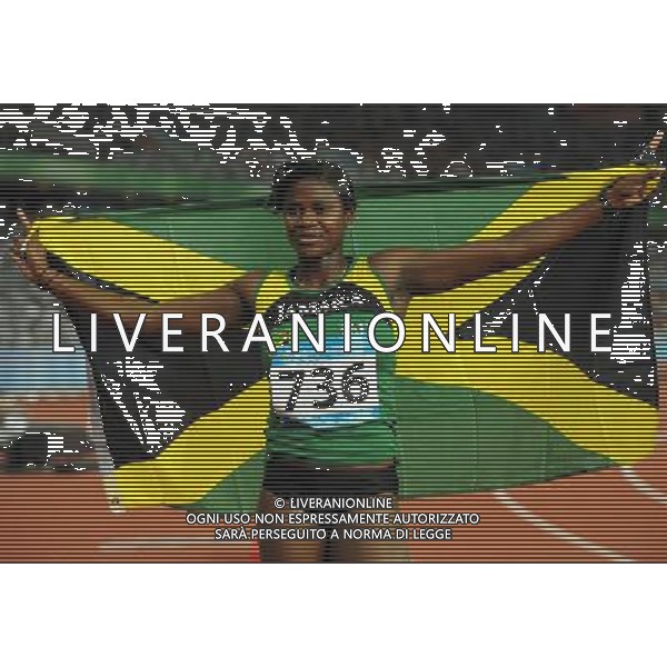 (110819) -- SHENZHEN, Aug. 19, 2011 () -- Anneisha Mclaughlin of Jamaica celebrates after finishing the women\'s 200m final of athletics event at the 26th Summer Universiade in Shenzhen, a city of south China\'s Guangdong Province, on Aug. 19, 2011. Anneisha Mclaughlin claimed the gold medal with a time of 22.54 seconds. (/Lin Yiguang)