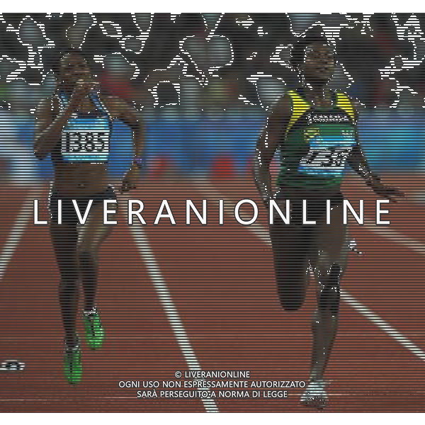 (110819) -- SHENZHEN, Aug. 19, 2011 () -- Anneisha Mclaughlin (R) of Jamaica competes during the women\'s 200m final of athletics event at the 26th Summer Universiade in Shenzhen, a city of south China\'s Guangdong Province, on Aug. 19, 2011. Anneisha Mclaughlin claimed the gold medal with a time of 22.54 seconds. (/Lin Yiguang)