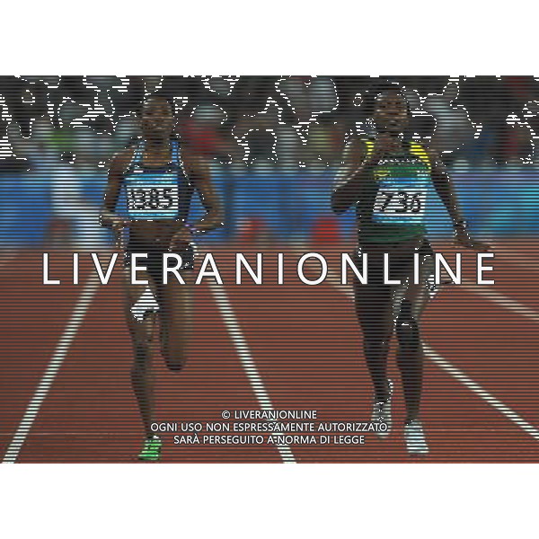 (110819) -- SHENZHEN, Aug. 19, 2011 () -- Anneisha Mclaughlin (R) of Jamaica competes during the women\'s 200m final of athletics event at the 26th Summer Universiade in Shenzhen, a city of south China\'s Guangdong Province, on Aug. 19, 2011. Anneisha Mclaughlin claimed the gold medal with a time of 22.54 seconds. (/Lin Yiguang)