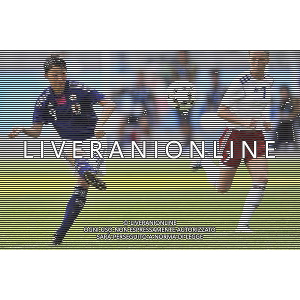 (110819) -- SHENZHEN, Aug. 19, 2011 () -- Ami Otaki (L) of Japan shoots to goal during the women\'s football semifinal against France at the 26th Summer Universiade in Shenzhen, a city of south China\'s Guangdong Province, Aug. 19, 2011. Japan won 3-2 to enter the final. (/Wang Haofei)(lm)