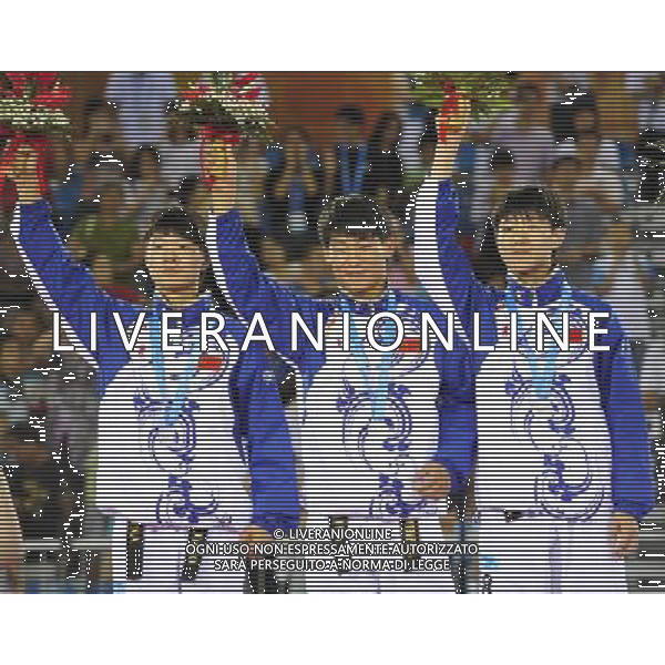 (110819) -- SHENZHEN, Aug. 19, 2011 () -- China\'s Zhu Yuxiang, Zhan Wenpeng and Guo Fan (from L to R) pose during the awarding ceremony of the men\'s team poomsae final at the 26th Summer Universiade in Shenzhen, a city of south China\'s Guangdong Province, Aug. 19, 2011. China won the silver. (/Liang Xu)(lm)