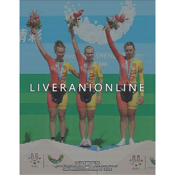 (110820) -- SHENZHEN, Aug. 20, 2011 () -- Gold medalist Lithuanian team react during the awarding ceremony of women\'s team time trial 30km on road of cycling track at the 26th Summer Universiade in Shenzhen, a city of south China\'s Guangdong Province, on Aug. 20, 2011. (/Lui Sui Wai)(wx)
