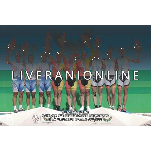(110820) -- SHENZHEN, Aug. 20, 2011 () -- Gold medalist Lithuanian team, silver medalist South Korean team and bronze medalist German team wave during the awarding ceremony of women\'s team time trial 30km on road of cycling track at the 26th Summer Universiade in Shenzhen, a city of south China\'s Guangdong Province, on Aug. 20, 2011. (/Lui Sui Wai)(wx)