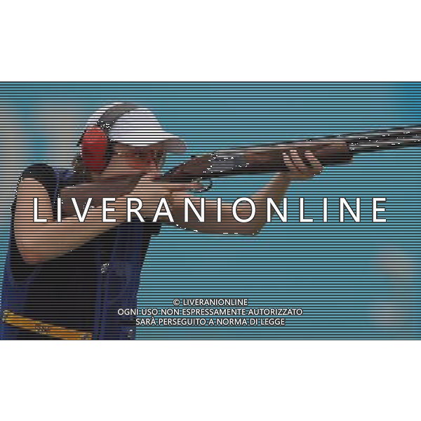 (110820) -- SHENZHEN, Aug. 20, 2011 () -- Anastasiia Kitaeva of Russia shoots during women\'s skeet team event of shotgun at the 26th Summer Universiade in Shenzhen, a city of south China\'s Guangdong Province, on Aug. 20, 2011. Russian team won the bronze medal with a total score of 197. (/Lin Yiguang)(wx)