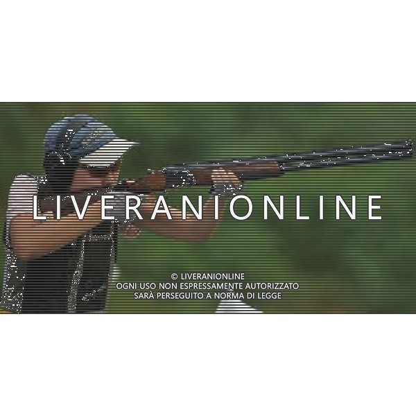 (110820) -- SHENZHEN, Aug. 20, 2011 () -- Zhaniya Aidarkhanova of Kazakhstan shoots during women\'s skeet team event of shotgun at the 26th Summer Universiade in Shenzhen, a city of south China\'s Guangdong Province, on Aug. 20, 2011. Kazakhstan\'s team won the silver medal with a total score of 200. (/Lin Yiguang)(wx)
