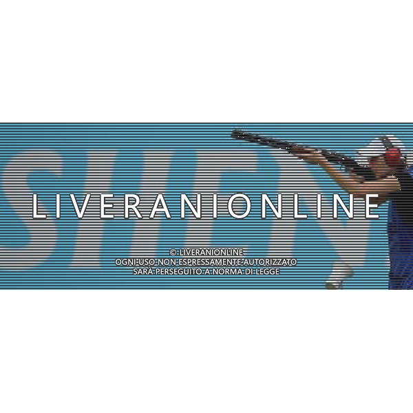 (110820) -- SHENZHEN, Aug. 20, 2011 () -- Anastasiia Kitaeva of Russia shoots during women\'s skeet team event of shotgun at the 26th Summer Universiade in Shenzhen, a city of south China\'s Guangdong Province, on Aug. 20, 2011. Russian team won the bronze medal with a total score of 197. (/Lin Yiguang)(wx)