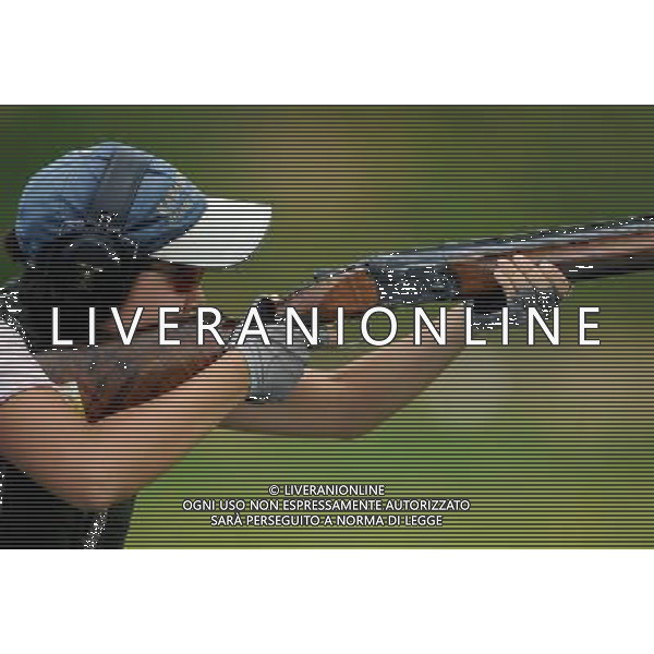 (110820) -- SHENZHEN, Aug. 20, 2011 () -- Zhaniya Aidarkhanova of Kazakhstan shoots during women\'s skeet team event of shotgun at the 26th Summer Universiade in Shenzhen, a city of south China\'s Guangdong Province, on Aug. 20, 2011. Kazakhstan\'s team won the silver medal with a total score of 200. (/Lin Yiguang)(wx)
