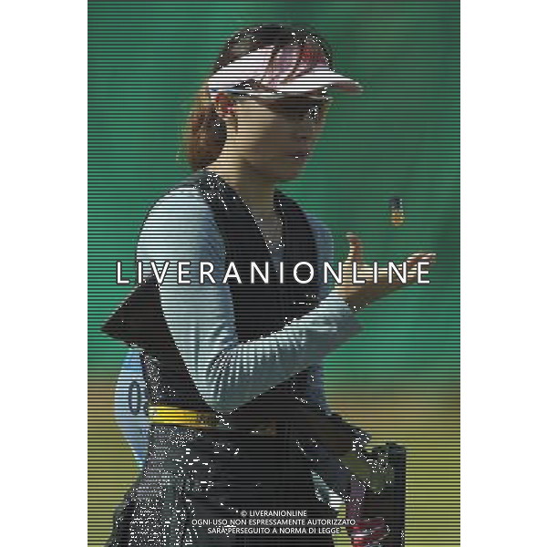 (110820) -- SHENZHEN, Aug. 20, 2011 () -- Yu Xiumin of China unloads the gun during the women\'s skeet final of shotgun at the 26th Summer Universiade in Shenzhen, a city of south China\'s Guangdong Province, Aug. 20, 2011. Yu Xiumin claimed the bronze medal of the event with a total of 94 hits. (/Lin Yiguang)