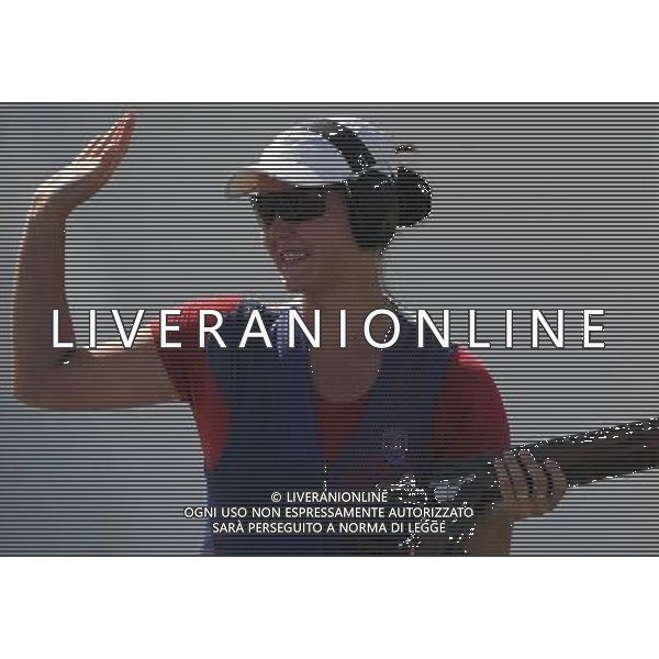 (110820) -- SHENZHEN, Aug. 20, 2011 () -- Monica Zemkova of Slovakia greets the spectators during the women\'s skeet final of shotgun at the 26th Summer Universiade in Shenzhen, a city of south China\'s Guangdong Province, Aug. 20, 2011. Monica Zemkova claimed the gold medal of the event. (/Lin Yiguang)