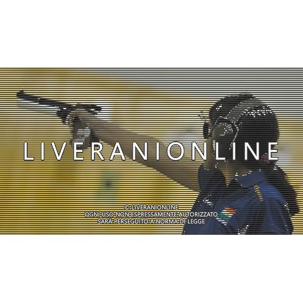 (110820) -- SHENZHEN, Aug. 20, 2011 () -- Ruby Tomar of India aims during the 10m air pistol women individual qualification of shooting event at the 26th Summer Universiade in Shenzhen, a city of south China\'s Guangdong Province, on Aug. 20, 2011. The team of India claimed the gold medal of women\'s 10m air pistol team event. (/Chen Yehua)