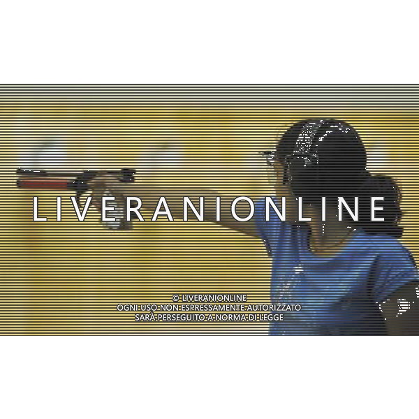 (110820) -- SHENZHEN, Aug. 20, 2011 () -- Harveen Srao of India aims during the 10m air pistol women individual qualification of shooting event at the 26th Summer Universiade in Shenzhen, a city of south China\'s Guangdong Province, on Aug. 20, 2011. The team of India claimed the gold medal of women\'s 10m air pistol team event. (/Chen Yehua)