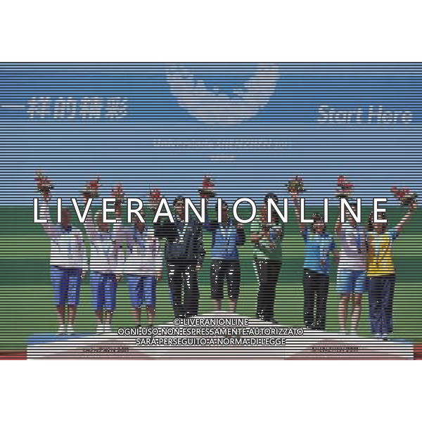 (110820) -- SHENZHEN, Aug. 20, 2011 () -- Gold medalists shooters of India (C), silver medalists shooters of Russia and bronze medalists shooters of Ukraine celebrate during the awarding ceremony of women\'s 10m air pistol team of shooting event at the 26th Summer Universiade in Shenzhen, a city of south China\'s Guangdong Province, on Aug. 20, 2011. (/Chen Yehua)