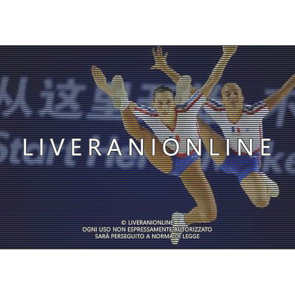 (110820) -- SHENZHEN, Aug. 20, 2011 () -- France\' Florian Fatnassi and Celia Milesi compete during the mixed pair qualification match of aerobic gymnastics event at the 26th Summer Universiade in Shenzhen, a city of south China\'s Guangdong Province, Aug. 20, 2011. (/Gong Lei)(bxf)