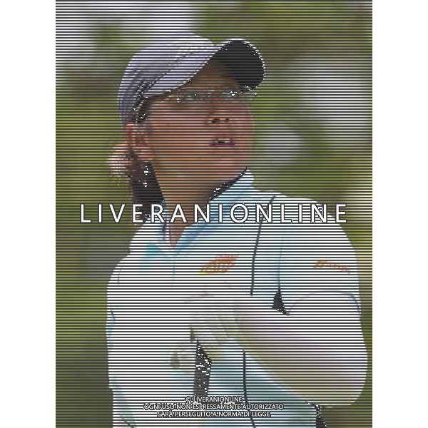 (110820) -- SHENZHEN, Aug. 20, 2011 () -- Lin Tzuchi of Chinese Taipei reacts during the women\'s individual tournament of golf event at the 26th Summer Universiade in Shenzhen, a city of south China\'s Guangdong Province, Aug. 20, 2011. Lin won the gold medal with 280 strokes. (/Meng Yongmin)(bxf)