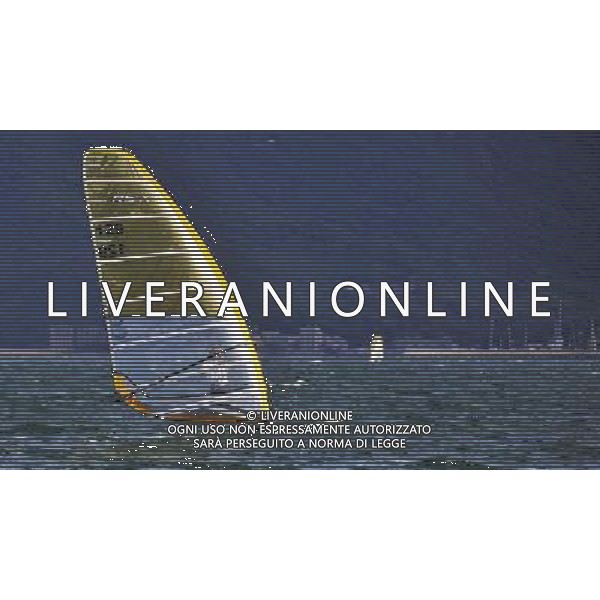 (110820) -- SHENZHEN, Aug. 20, 2011 () -- Lukasz Grodzicki of Poland competes during the men\'s RS:X (windsurf) race of sailing event at the 26th Summer Universiade in Shenzhen, a city of south China\'s Guangdong Province, Aug. 20, 2011. Lukasz Grodzicki ranked the 2nd with a net points of 20 after 10 races. (/Wang Haofei)(bxf)