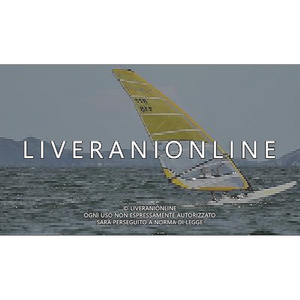 (110820) -- SHENZHEN, Aug. 20, 2011 () -- Fang Zhennan of China competes during the men\'s RS:X (windsurf) race of sailing event at the 26th Summer Universiade in Shenzhen, a city of south China\'s Guangdong Province, Aug. 20, 2011. Fang ranked the 1st with a net points of 17 after 10 races. (/Wang Haofei)(bxf)
