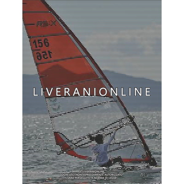 (110820) -- SHENZHEN, Aug. 20, 2011 () -- Komine Megumi of Japan competes during the women\'s RS:X (windsurf) race of sailing event at the 26th Summer Universiade in Shenzhen, a city of south China\'s Guangdong Province, Aug. 20, 2011. Komine ranked the 2nd with a net points of 28 after 10 Races. (/Wang Haofei)(bxf)