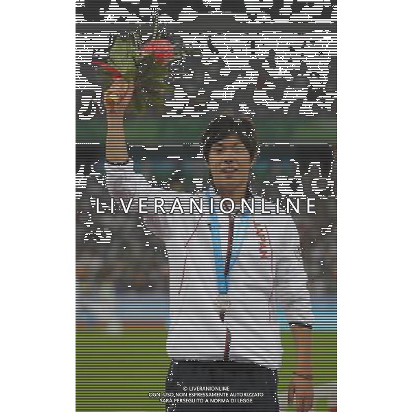 (110819) -- SHENZHEN, Aug. 19, 2011 () -- Takayuki Kishimoto of Japan celebrates at the awarding ceremony of the men\'s 400m hurdles of athletics event at the 26th Summer Universiade in Shenzhen, a city of south China\'s Guangdong Province, on Aug. 19, 2011. Takayuki Kishimoto claimed the silver medal with a time of 49.52 seconds. (/Lui Siu Wai)