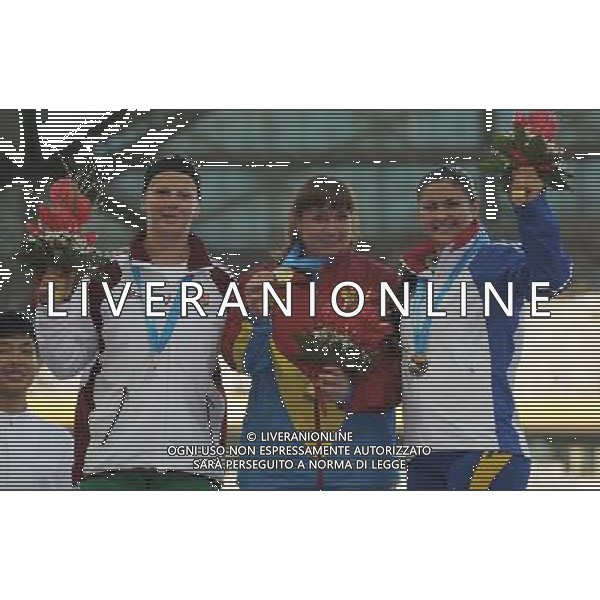 (110819) -- SHENZHEN, Aug. 19, 2011 () -- Gold medalist Zalina Marghieva of Moldova (C), silver medalist Eva Orban of Hungary (L), and bronze medalist Bianca Florentina Perie of Romania pose during the awarding ceremony of the women\'s hammer of athletics event at the 26th Summer Universiade in Shenzhen, a city of south China\'s Guangdong Province, on Aug. 19, 2011. (/Lui Siu Wai)