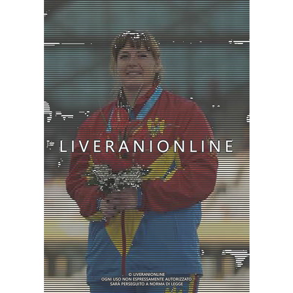 (110819) -- SHENZHEN, Aug. 19, 2011 () -- Zalina Marghieva of Moldova poses during the awarding ceremony of the women\'s hammer of athletics event at the 26th Summer Universiade in Shenzhen, a city of south China\'s Guangdong Province, on Aug. 19, 2011. Zalina Marghieva won the gold medal of the event with 72.93 meters. (/Lui Siu Wai)