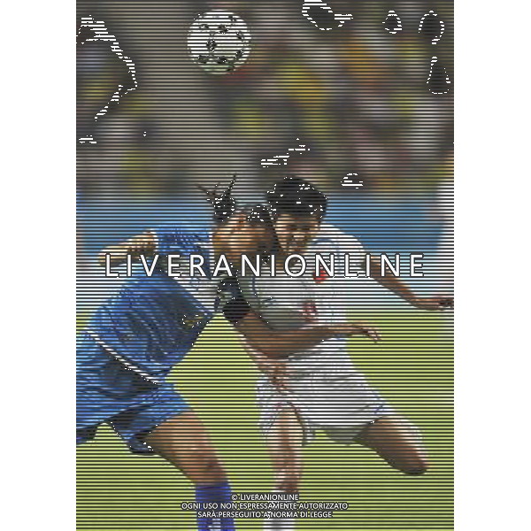 (110819) -- SHENZHEN, Aug. 19, 2011 () -- Wang Shanshan (R) of China heads the ball with Renata Diniz of Brazil during the women\'s football semifinal at the 26th Summer Universiade in Shenzhen, a city of south China\'s Guangdong Province, Aug. 19, 2011. China won 4-3 on a penalty shoot-out, after a 1-1 draw. (/Wang Haofei)(lm)