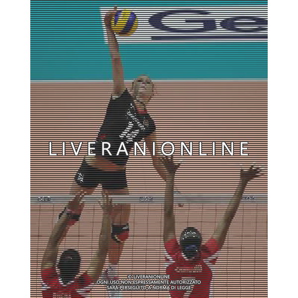 (110820) -- HONG KONG, Aug. 20, 2011 () -- Margareta Kozuch (back) of Germany spikes the ball during the Group J match of the women\'s World Grand Prix Hong Kong session between Germany and Peru in Hong Kong, south China, Aug. 20, 2011. Germany won 3-1. (/Li Qiuchan)