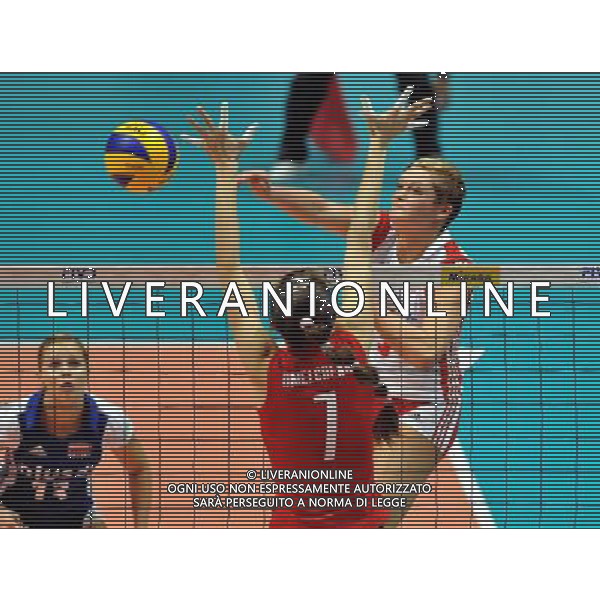 (110819) -- HONG KONG, Aug. 19, 2011 () -- Karolina Kosek (R) of Poland spikes the ball during the Group I match of the women\'s World Grand Prix Hong Kong session between Poland and Kazakhstan in Hong Kong, south China, Aug. 19, 2011. Poland won 3-0. (/Lo Ping Fai)(bxf)