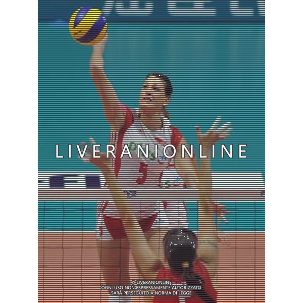 (110819) -- HONG KONG, Aug. 19, 2011 () -- Berenika Okuniewska (Back) of Poland spikes the ball during the Group I match of the women\'s World Grand Prix Hong Kong session between Poland and Kazakhstan in Hong Kong, south China, Aug. 19, 2011. Poland won 3-0. (/Lo Ping Fai)(bxf)