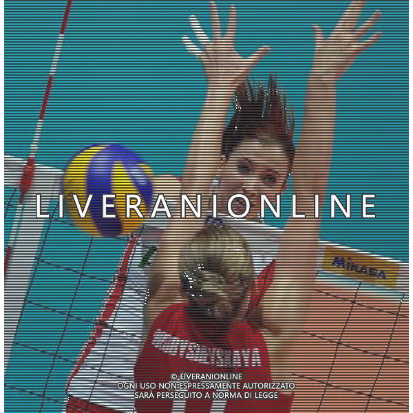 (110819) -- HONG KONG, Aug. 19, 2011 () -- Klaudia Kaczorowska (Back) of Poland spikes the ball during the Group I match of the women\'s World Grand Prix Hong Kong session between Poland and Kazakhstan in Hong Kong, south China, Aug. 19, 2011. Poland won 3-0. (/Lo Ping Fai)(bxf)