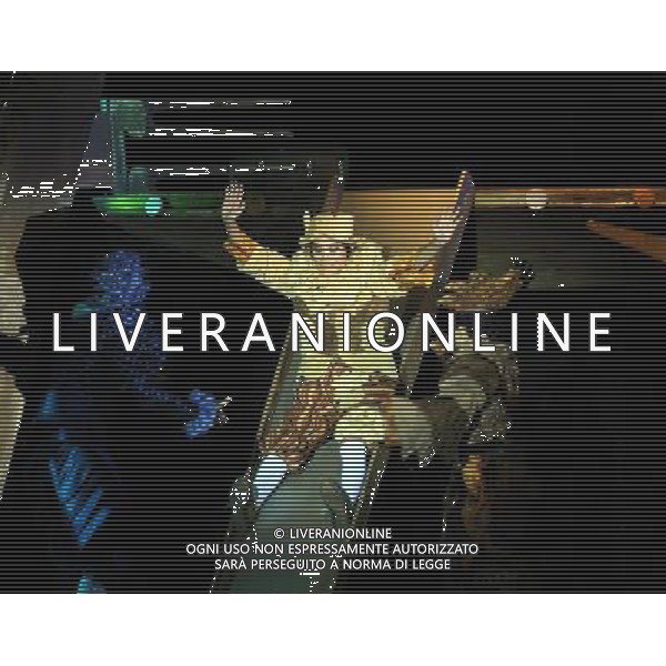 (110820) -- HARBIN, Aug. 20, 2011 () -- \'Gingerbread man\' (C) performs during the debut of musical play \'the Gingerbread Man\' in Harbin Drama Theater in Harbin, capital of northeast China\'s Heilongjiang Province, Aug. 20, 2011. \'The Gingerbread Man\', a well-known musical play for children created by English playwright David Wood, was staged here on Saturday. (/Wang Song) (xzj)