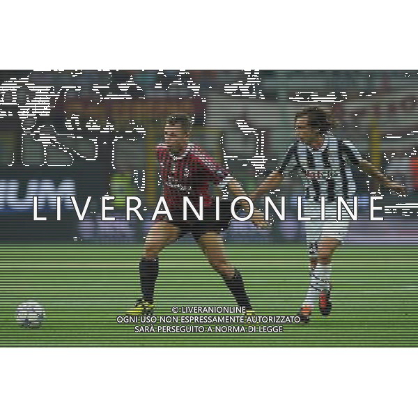 Trofeo Luigi Berlusconi Milano 21-08-2011 Milan - Juventus nella foto: Antonio Cassano (Milan) strattonato da Andrea Pirlo (Juventus) foto Roberto Garavaglia - ag. Aldo Liverani sas