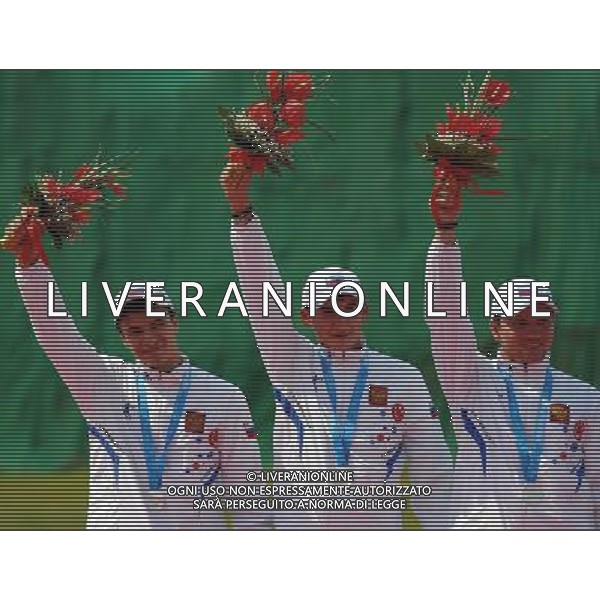 (110822) -- SHENZHEN, Aug. 22, 2011 () -- Silver medalists Russia\'s team react during the awarding ceremony of men\'s double trap team event of shotgun at the 26th Summer Universiade in Shenzhen, a city of south China\'s Guangdong Province, on Aug. 22, 2011. Russian team won the silver with a total score of 423. (/Lin Yiguang)(wx)