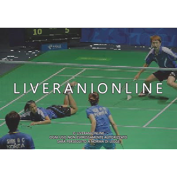 (110822) -- SHENZHEN, Aug. 22, 2011 () -- Hsieh Peichen (L) of Chinese Taipei fails to save the shuttle during mixed doubles match of badminton at the 26th Summer Universiade in Shenzhen, a city of south China\'s Guangdong Province, on Aug. 22, 2011. Lee Shengmu/Hsieh Peichen of Chinese Taipei lost Shin Baek Cheol/Eom Hye Won of South Korea 1-2 to win the silver medal. (/Wang Song)(wx)