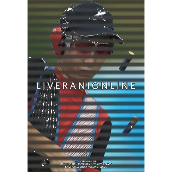 (110822) -- SHENZHEN, Aug. 22, 2011 () -- Hwang Sung Jin of South Korea unloads during men\'s double trap event of shotgun at the 26th Summer Universiade in Shenzhen, a city of south China\'s Guangdong Province, on Aug. 22, 2011. Hwang Sung Jin won the bronze medal with a total score of 191. (/Lin Yiguang)(wx)
