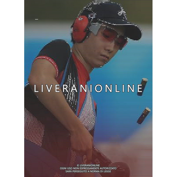 (110822) -- SHENZHEN, Aug. 22, 2011 () -- Hwang Sung Jin of South Korea unloads during men\'s double trap event of shotgun at the 26th Summer Universiade in Shenzhen, a city of south China\'s Guangdong Province, on Aug. 22, 2011. Hwang Sung Jin won the bronze medal with a total score of 191. (/Lin Yiguang)(wx)