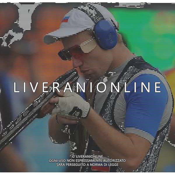 (110822) -- SHENZHEN, Aug. 22, 2011 () -- Alexander Furasyev of Russia competes during men\'s double trap event of shotgun at the 26th Summer Universiade in Shenzhen, a city of south China\'s Guangdong Province, on Aug. 22, 2011. Alexander Furasyev won the gold medal with a total score of 193. (/Lin Yiguang)(wx)