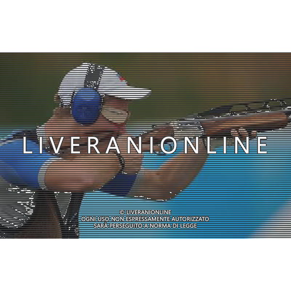 (110822) -- SHENZHEN, Aug. 22, 2011 () -- Alexander Furasyev of Russia shoots during men\'s double trap event of shotgun at the 26th Summer Universiade in Shenzhen, a city of south China\'s Guangdong Province, on Aug. 22, 2011. Alexander Furasyev won the gold medal with a total score of 193. (/Lin Yiguang)(wx)