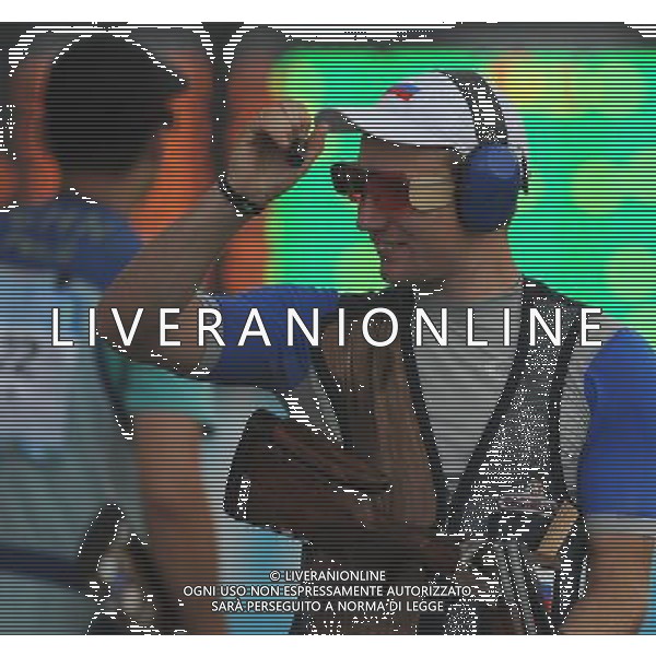 (110822) -- SHENZHEN, Aug. 22, 2011 () -- Alexander Furasyev of Russia celebrates during men\'s double trap event of shotgun at the 26th Summer Universiade in Shenzhen, a city of south China\'s Guangdong Province, on Aug. 22, 2011. Alexander Furasyev won the gold medal with a total score of 193. (/Lin Yiguang)(wx)