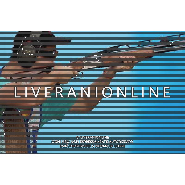 (110822) -- SHENZHEN, Aug. 22, 2011 () -- Pan Qiang of China shoots during men\'s double trap team event of shotgun at the 26th Summer Universiade in Shenzhen, a city of south China\'s Guangdong Province, on Aug. 22, 2011. China won the gold medal with a total score of 427. (/Lin Yiguang)(wx)