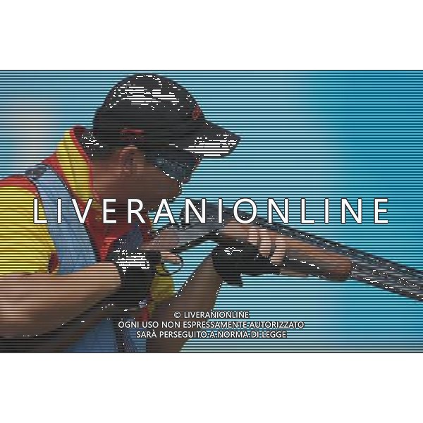 (110822) -- SHENZHEN, Aug. 22, 2011 () -- Yang Yiyang of China completes during men\'s double trap team event of shotgun at the 26th Summer Universiade in Shenzhen, a city of south China\'s Guangdong Province, on Aug. 22, 2011. China won the gold medal with a total score of 427. (/Lin Yiguang)(wx)