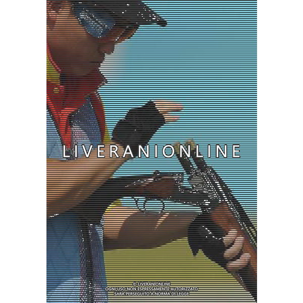 (110822) -- SHENZHEN, Aug. 22, 2011 () -- Yang Yiyang of China unloads during men\'s double trap team event of shotgun at the 26th Summer Universiade in Shenzhen, a city of south China\'s Guangdong Province, on Aug. 22, 2011. China won the gold medal with a total score of 427. (/Lin Yiguang)(wx)