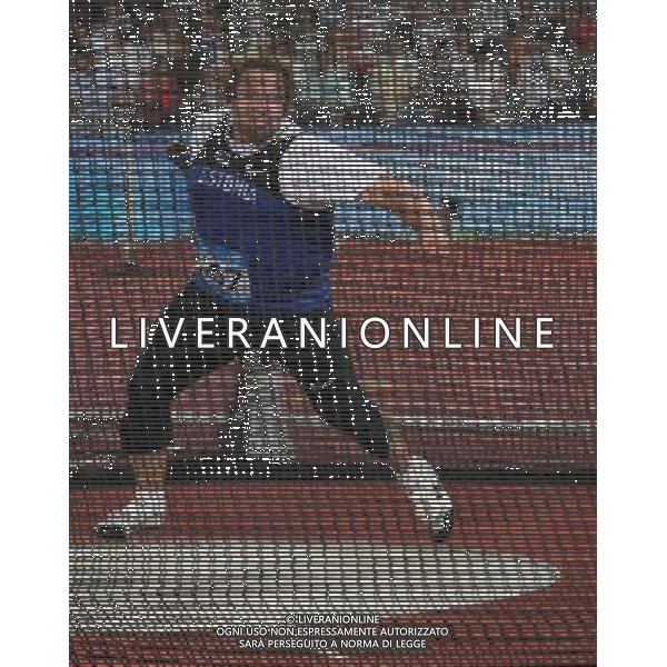 (110821) -- SHENZHEN, Aug. 21, 2011 () -- Mart Israel of Estonia competes during the men\'s discus final of athletics at the 26th Summer Universiade in Shenzhen, a city of south China\'s Guangdong Province, on Aug. 21, 2011. Mart Israel claimed the title with 64.07 metres. (/Li Ming)(wll)