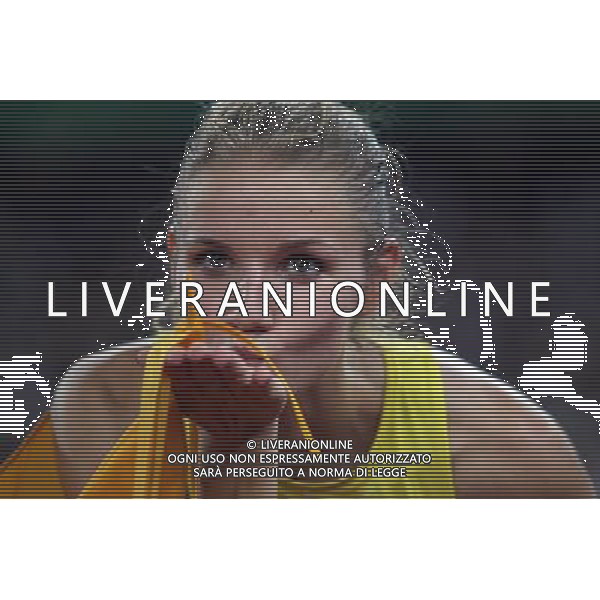 (110821) -- SHENZHEN, Aug. 21, 2011 () -- Silver medalist Airine Palsyte of Lithuania reacts after the women\'s high jump final of athletics at the 26th Summer Universiade in Shenzhen, a city of south China\'s Guangdong Province, on Aug. 21, 2011. (/Li Ming)(wll)