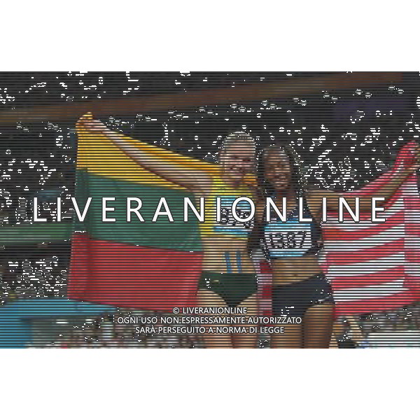 (110821) -- SHENZHEN, Aug. 21, 2011 () -- Gold medalist Brigetta Barrett (R) of the United States celebrates with silver medalist Airine Palsyte of Lithuania after the women\'s high jump final of athletics at the 26th Summer Universiade in Shenzhen, a city of south China\'s Guangdong Province, on Aug. 21, 2011. (/Li Ming)(wll)