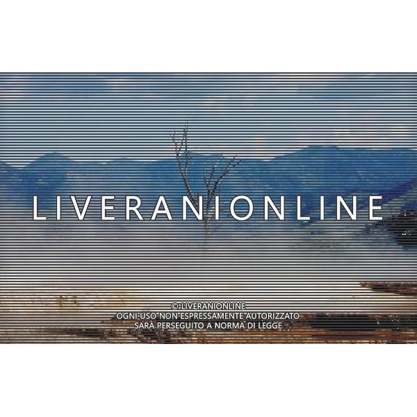 (110821) -- NEW YORK, Aug. 21, 2011 () -- Photo taken on Aug. 8, 2011 shows the scenery of Mammoth Hot Springs in Yellowstone National Park, the United States. Established in 1872, Yellowstone is a national park located primarily in the state of Wyoming, although it also extends into Montana and Idaho. Yellowstone was the first national park in the world and is known for its wildlife and its many geothermal features. (/Shen Hong) (wjd)